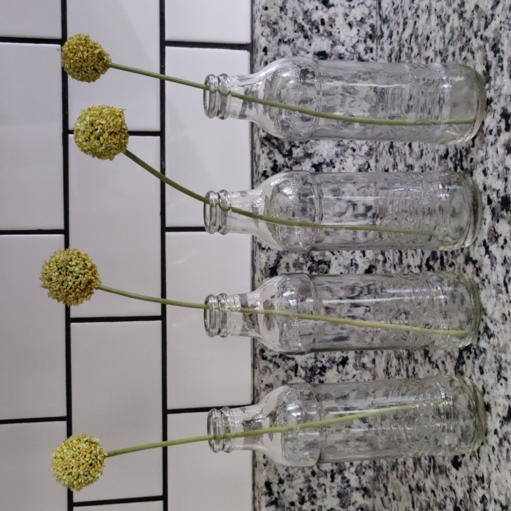 Set Of Four Glass Bottle Vases *Flowers not Included